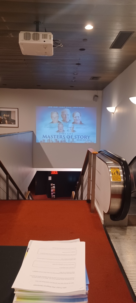 Photograph of entrance to Florence Gould Hall in NYC featuring MASTERS OF STORY graphic.